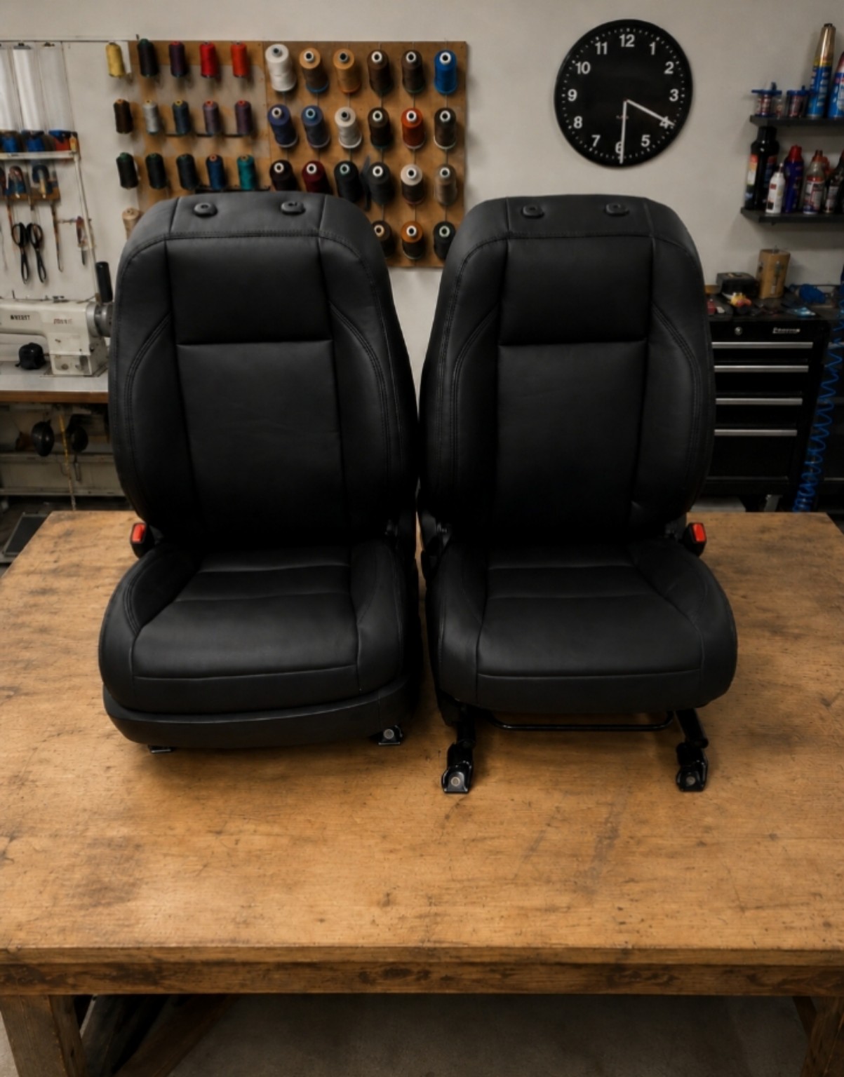 Pair of black automotive seats